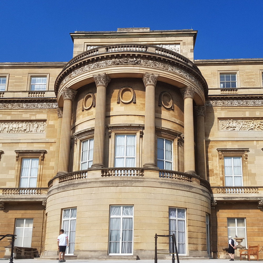 The curved bay of Buckingham Palace's garden front, with columns and carved stone panels