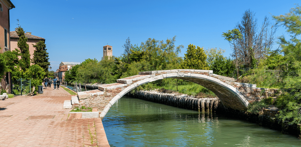 Photo of Ponte di Diavolo and Cathredral Santa Maria Assunta Torcello Italy