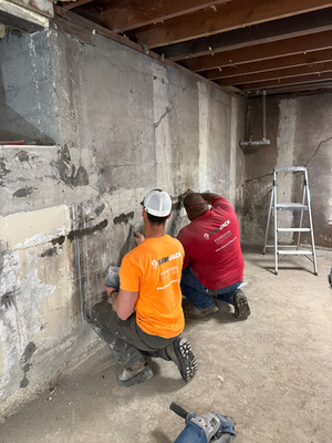 Preparing foundation wall crack for epoxy injection repair