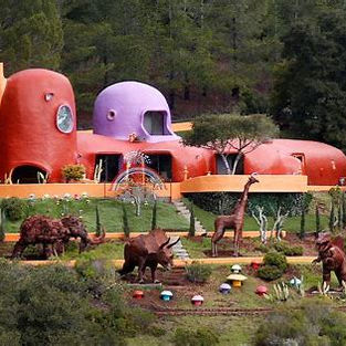the Flintstone House with a yabba dabba story
