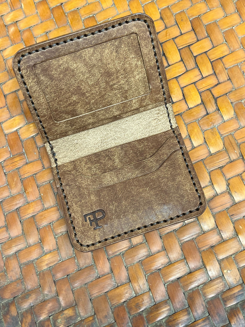 Thumbnail: Handcrafted open brown leather wallet with card slots