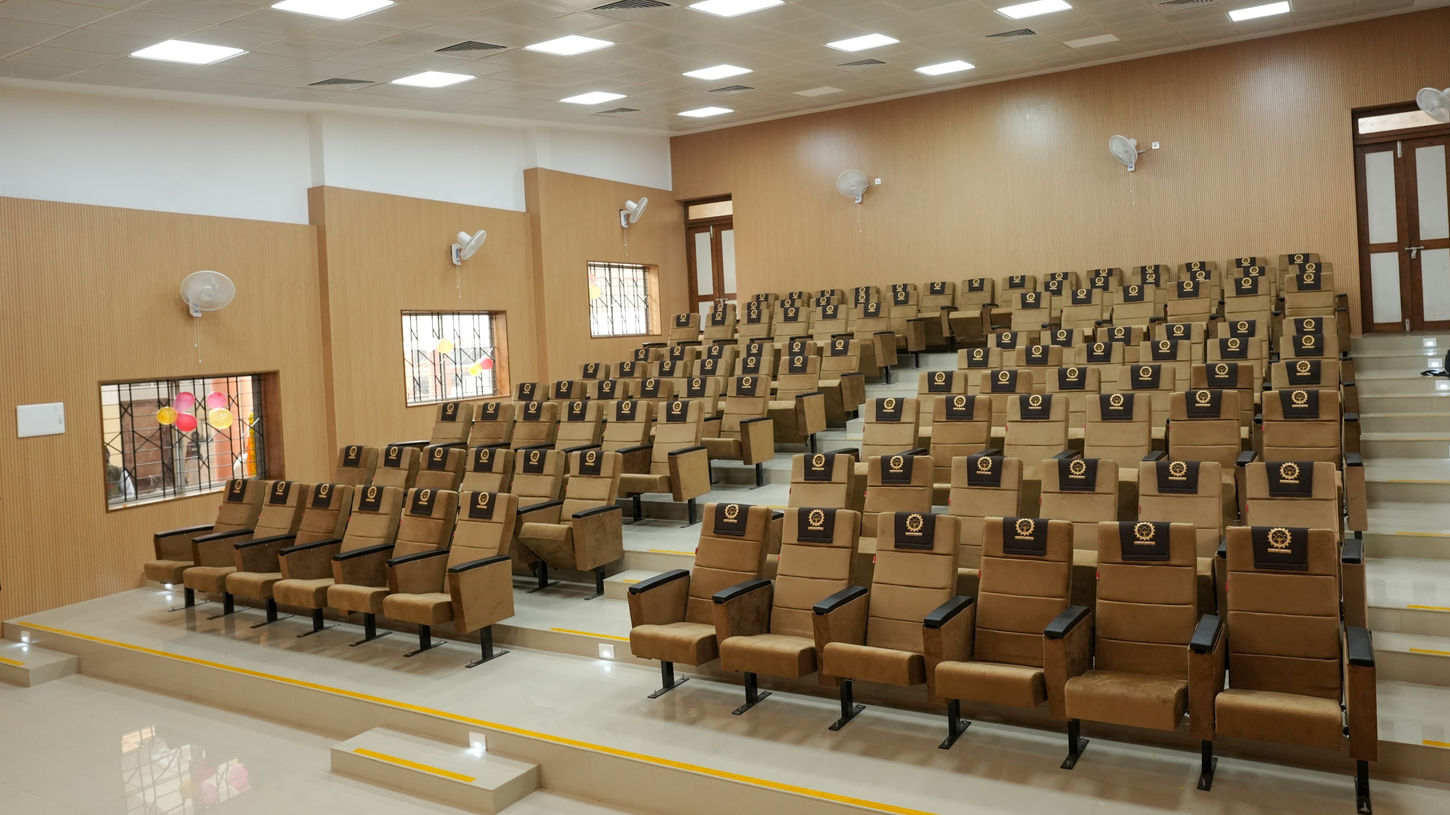 Interior view of a modern lecture hall and seating at NIT Calicut