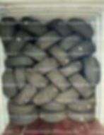 Tires stacked inside a container