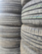 Two stacks of used tires
