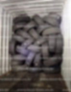Shipping container filled with new tires
