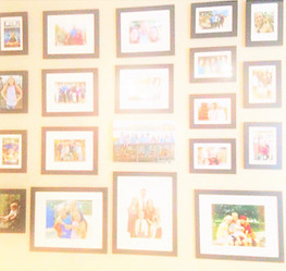 blurred for privacy- pics on wall.jpg