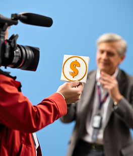 Journalist receiving payment_reward symbol.jpg
