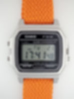 Modded silver Casio F91WM-7A with lugs cut on a orange perlon 