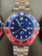 Custom blue dial with blue and red bezel Duro on a stainless steel bracelet