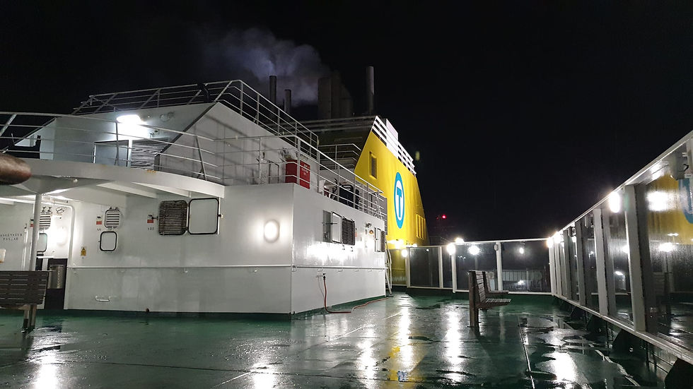 exterior deck on ferry at night