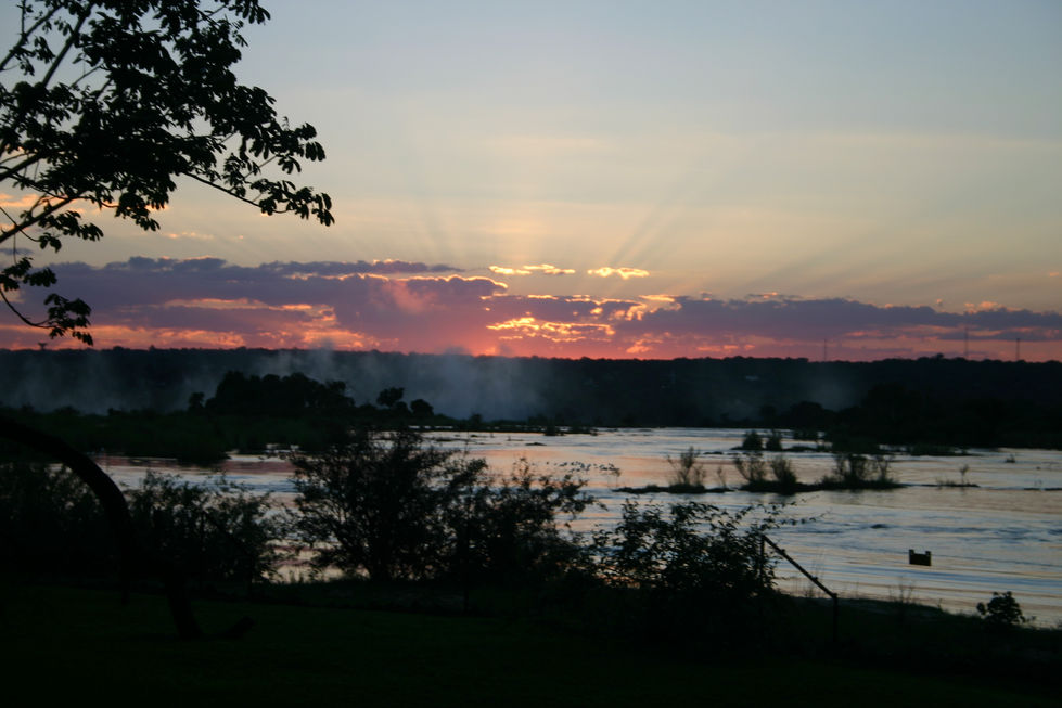 031+IMG_3724+Sunset+on+Zambezi+and+Falls+Mist