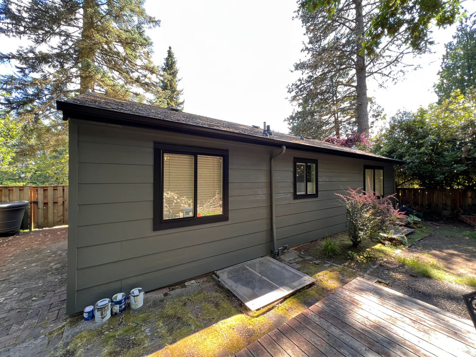 Professional installation of James Hardie-plank siding and crisp white trim on a SW Portland home, featuring a two-coat Sherwin-Williams Duration paint finish by Amazing Painting & Renovation.