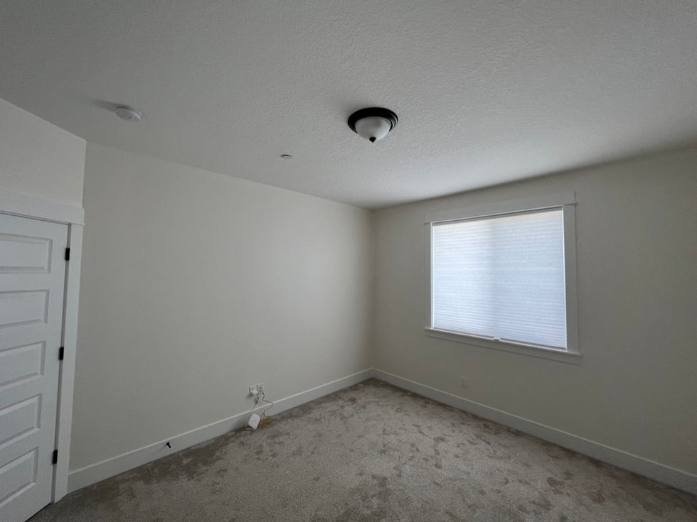Finished interior painting with soft white walls and ceilings in a Tualatin home by Amazing Painting & Renovation.