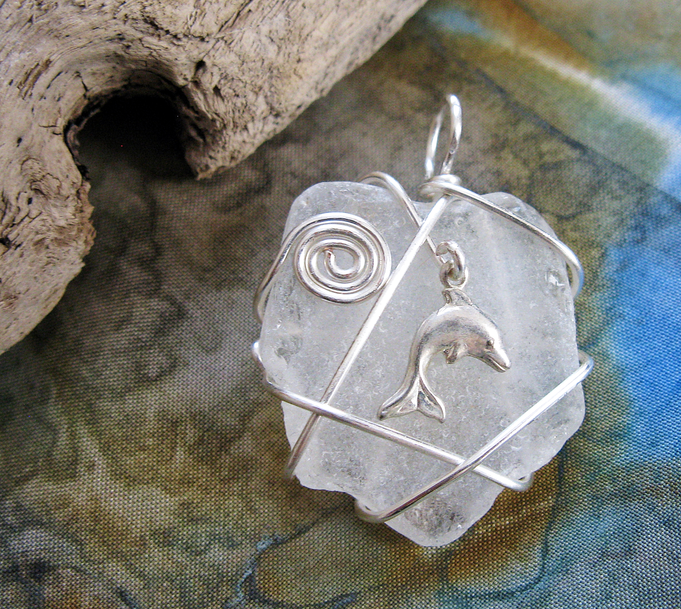 Sea glass pendant with dolphin