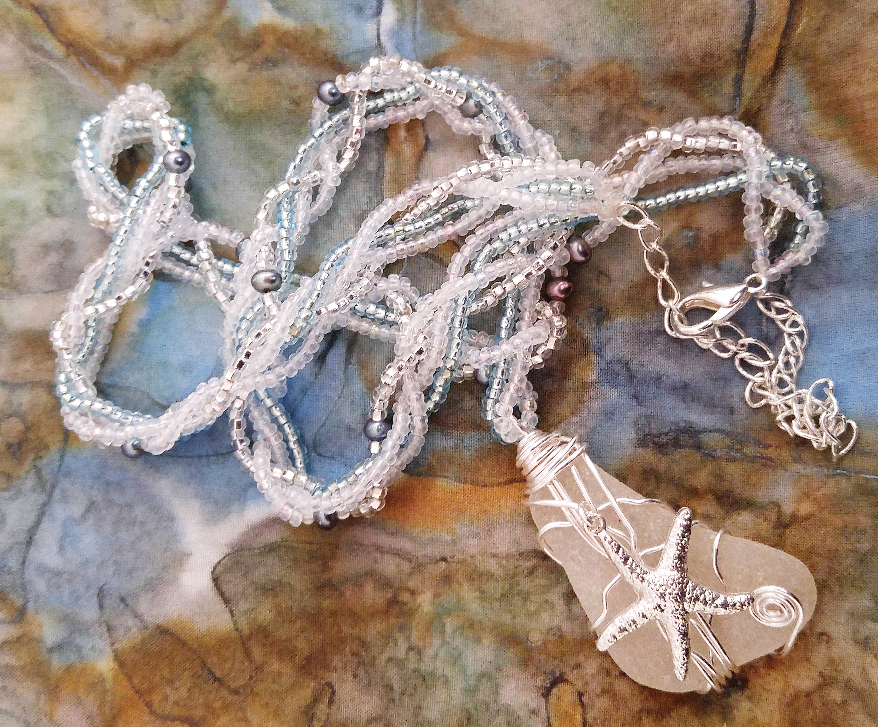 Sea star pendant with braided chain