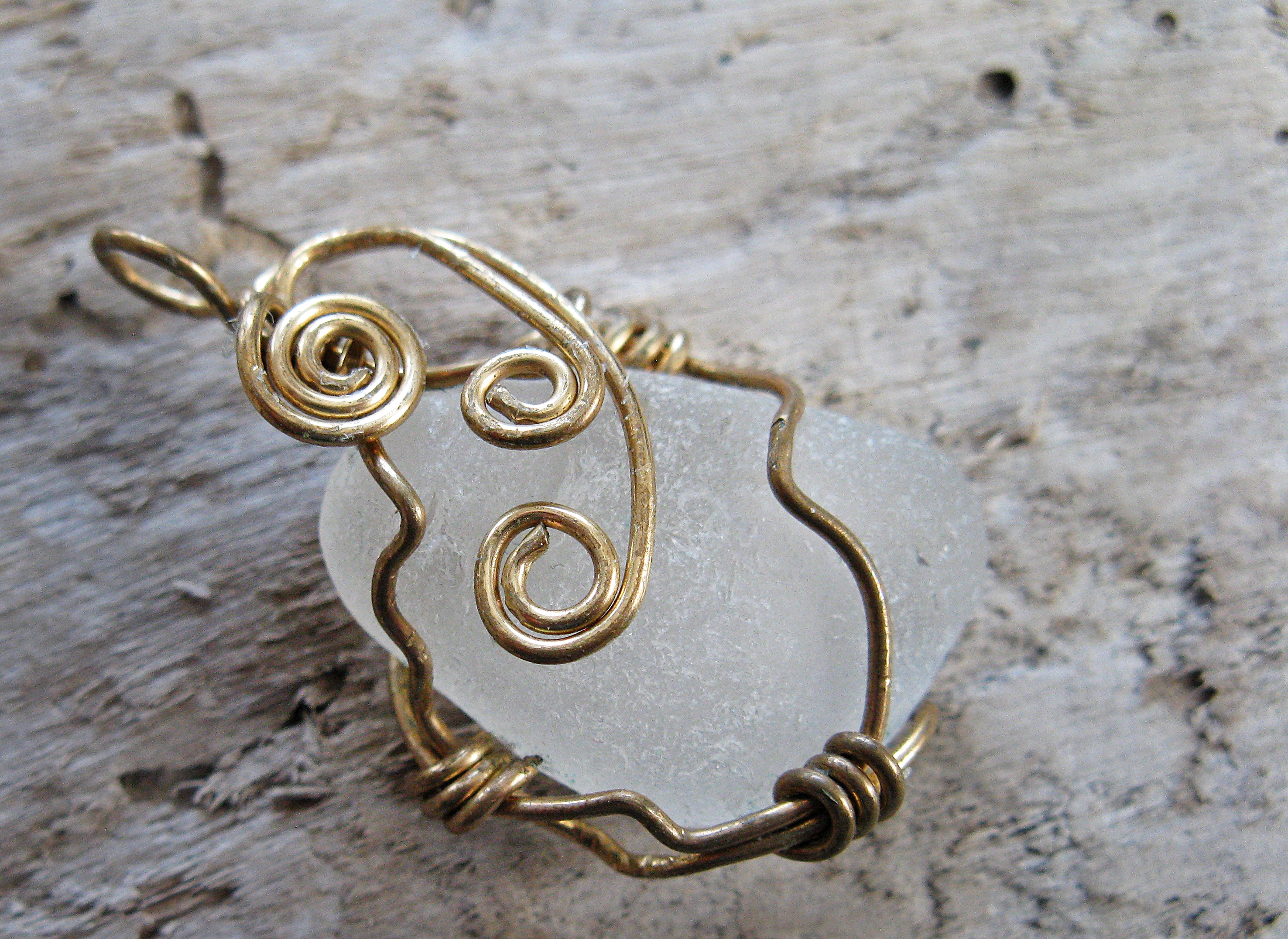 Triple spiral sea glass pendant