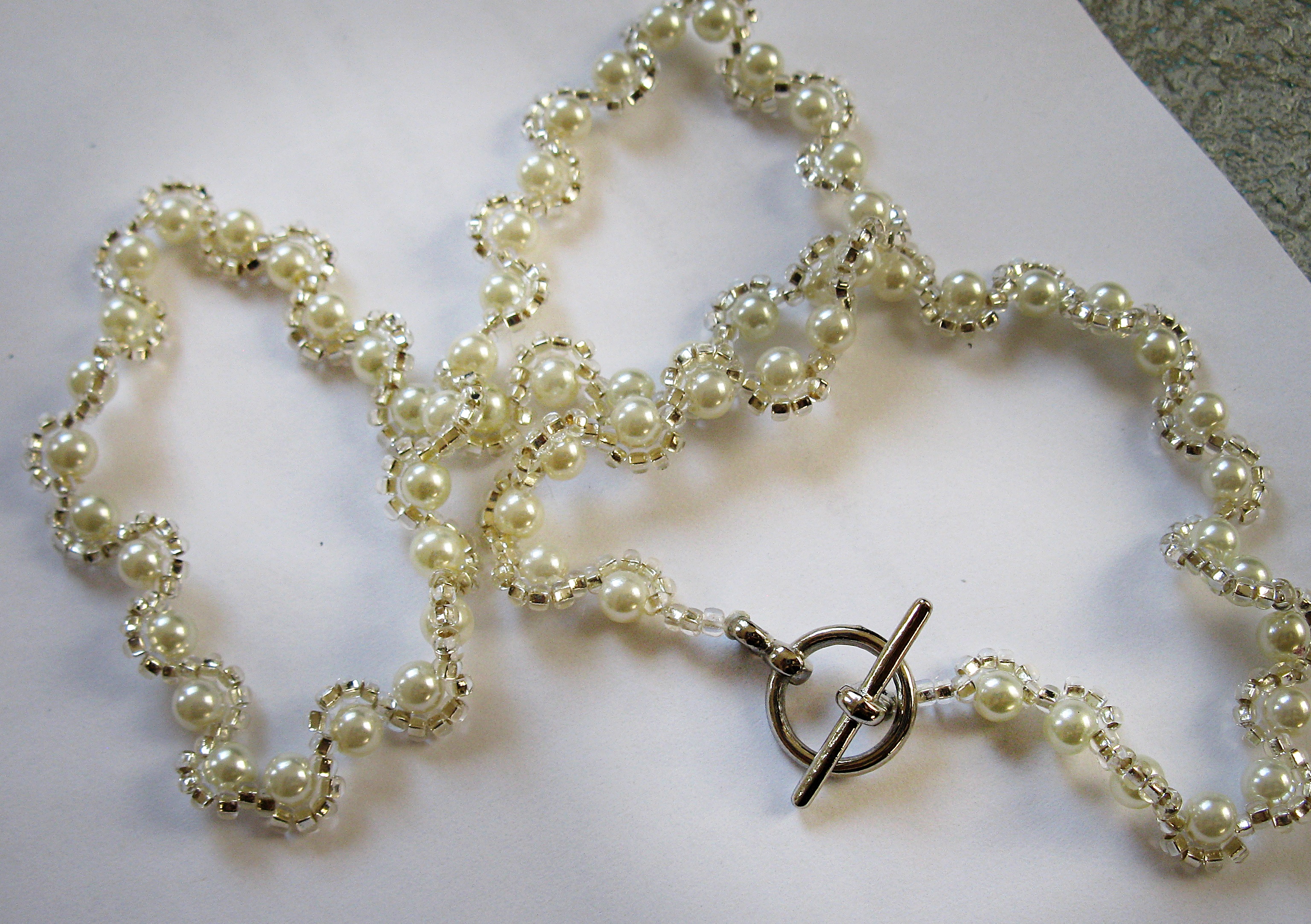 Silver and white with toggle clasp