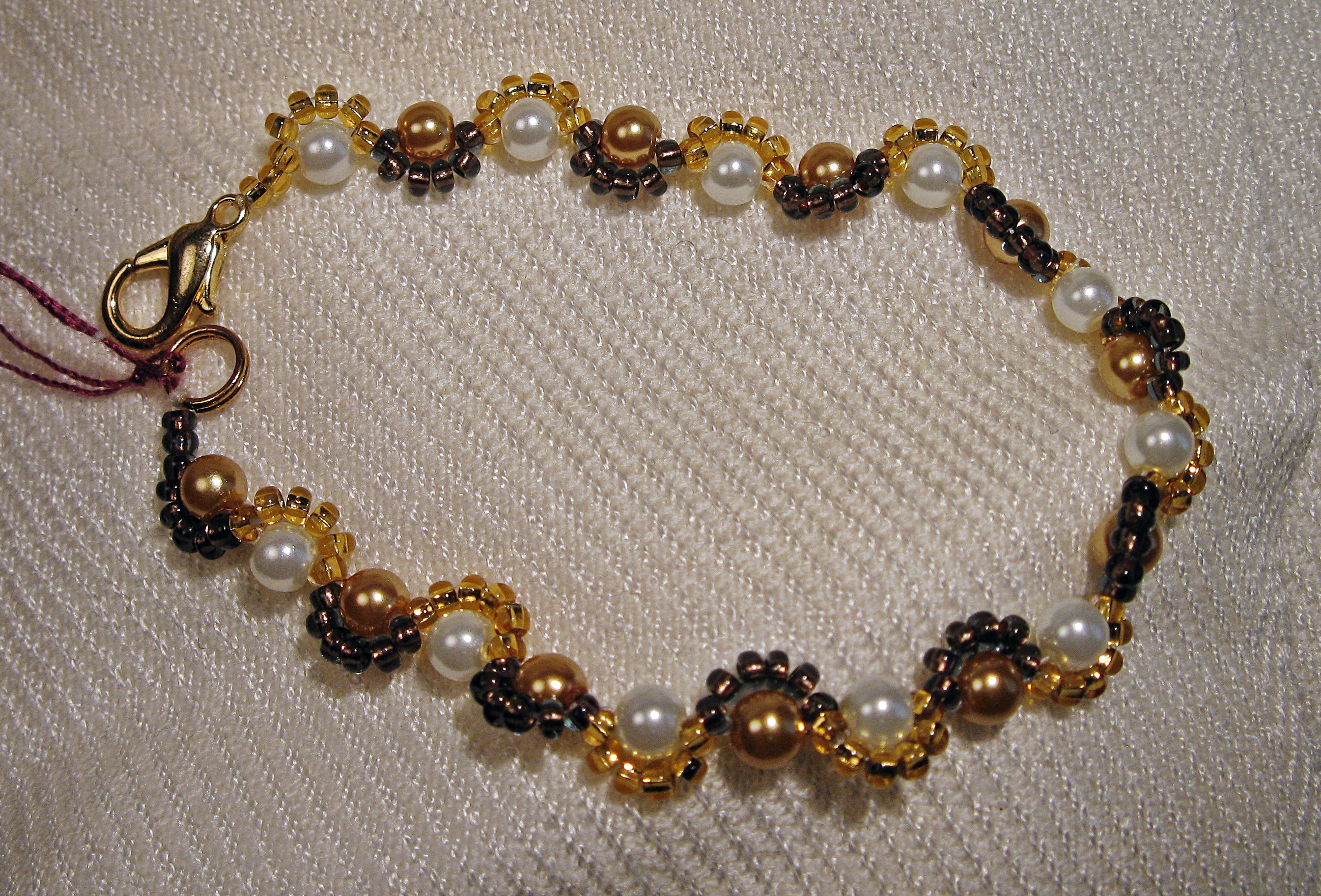 Golden Harlequin pearl bracelet