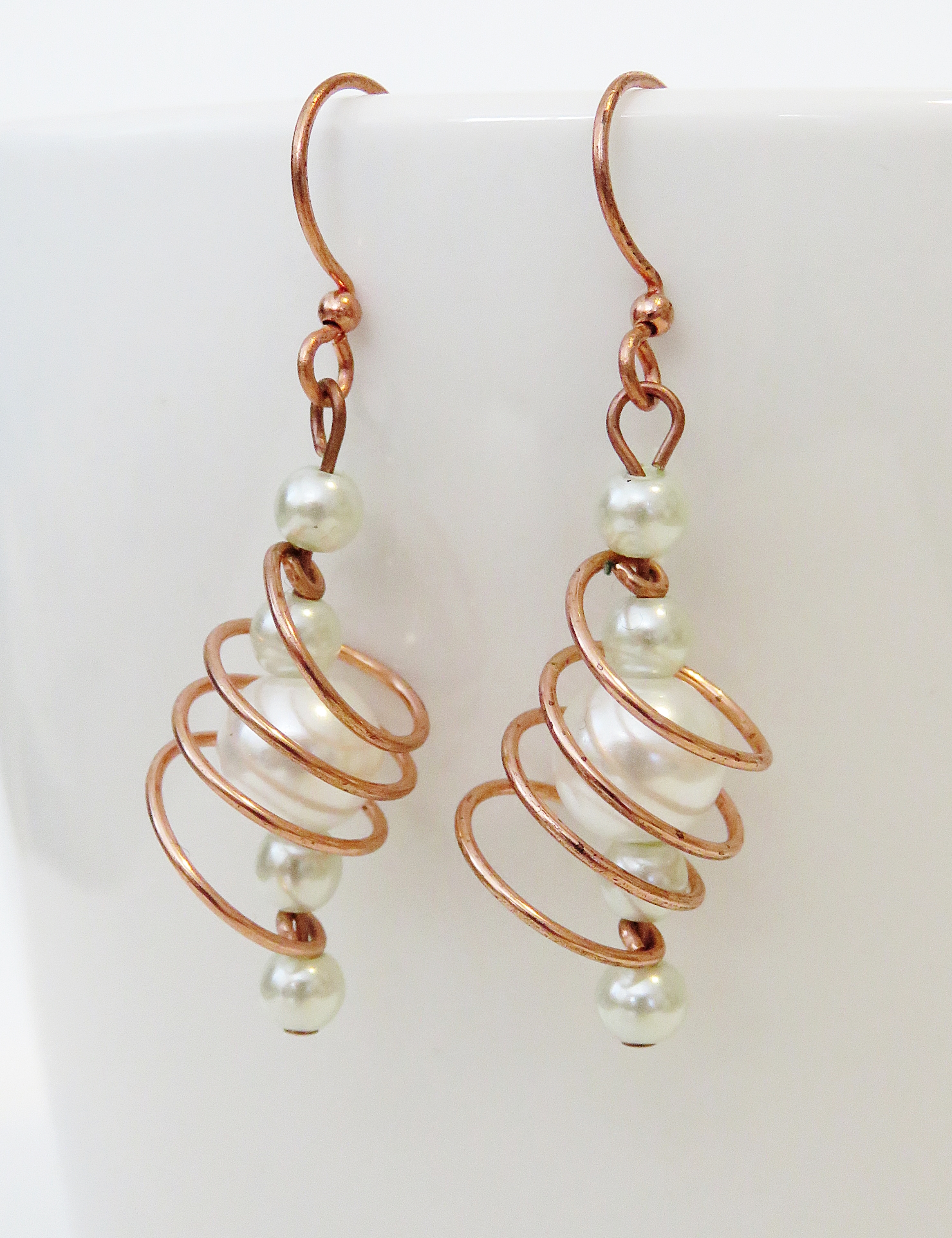 Copper and white freeform coils