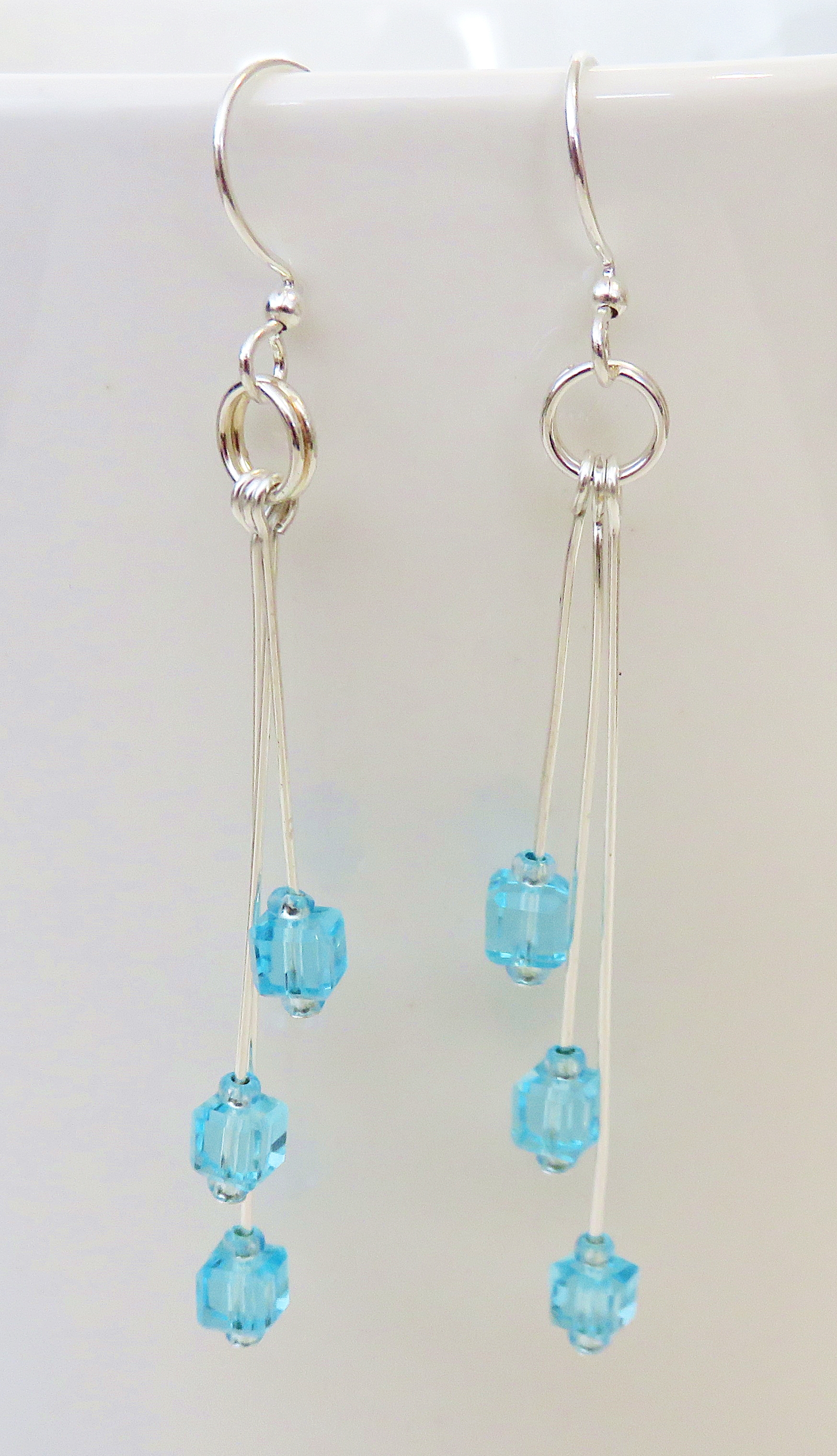 Cut blue glass dangles