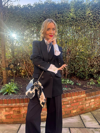 Laura Whitmore wears Baines London scarf