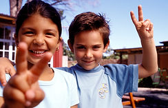 A pair of happy children that are having fun