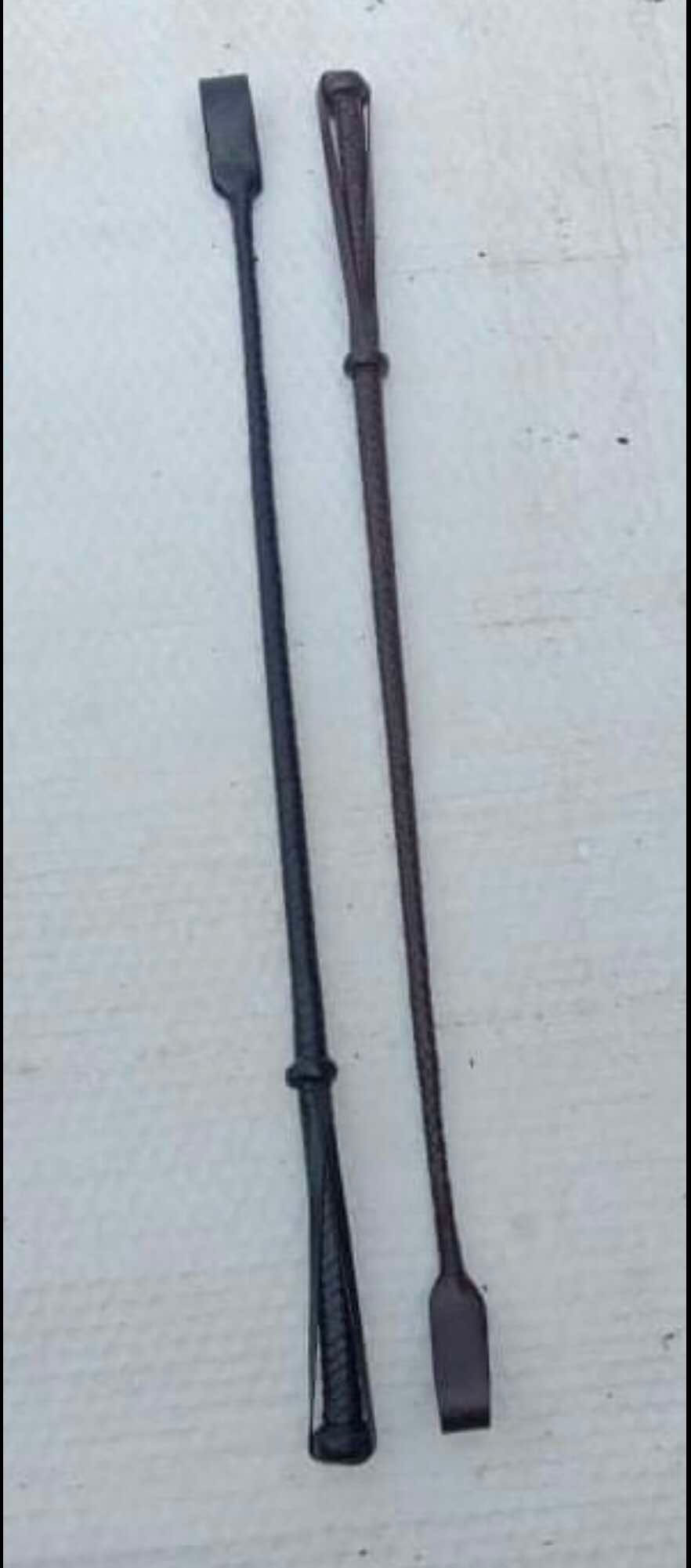 Black and Havana hand made leather horse whips.