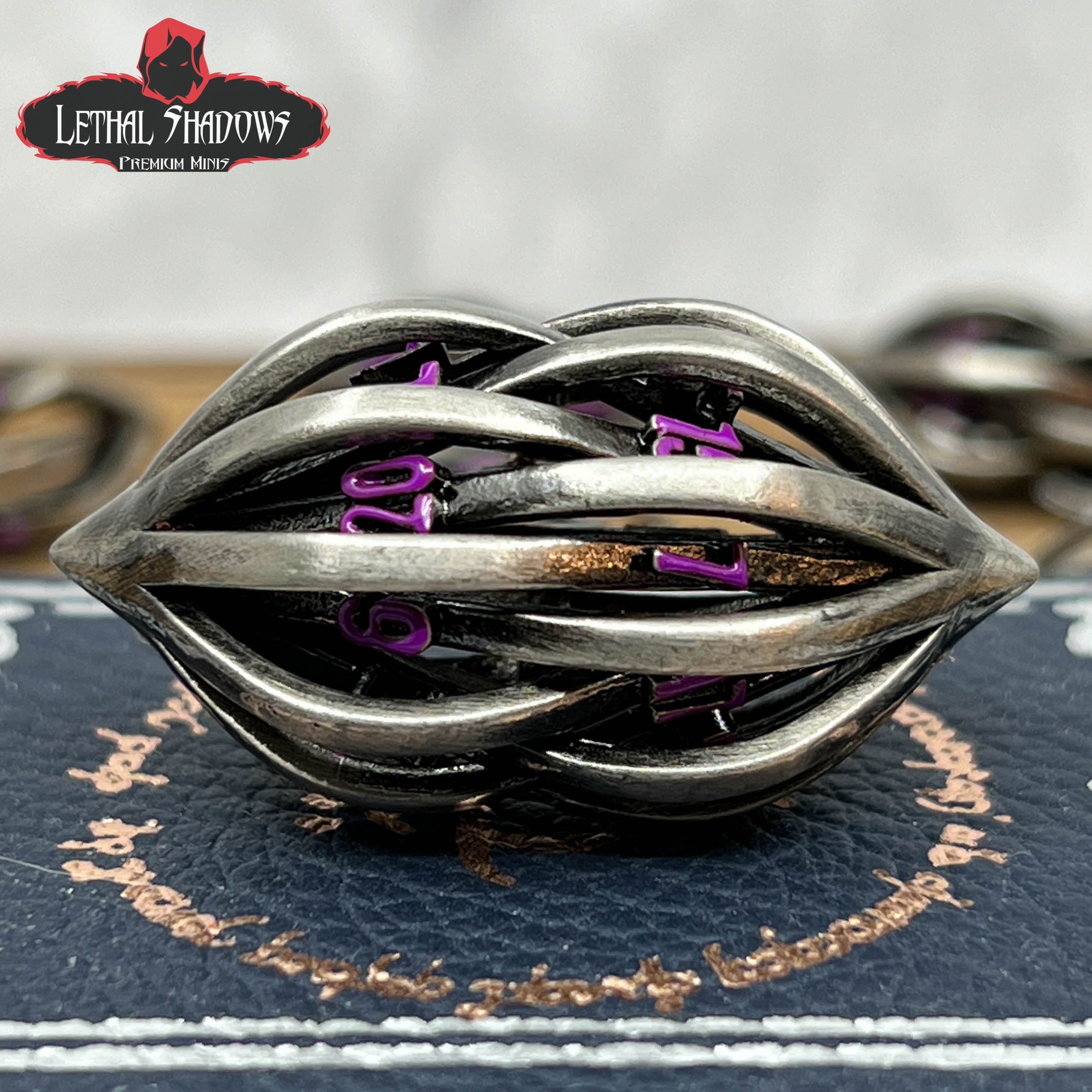 Intricate silver ring with purple accents