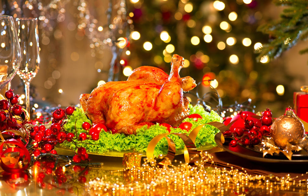 Christmas table setting with turkey. Christmas dinner. Holiday decorated table, Christmas tree, champagne and roasted turkey, Christmas served table