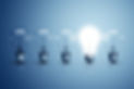 Five bulbs on a blue background and one of them is glowing..jpg