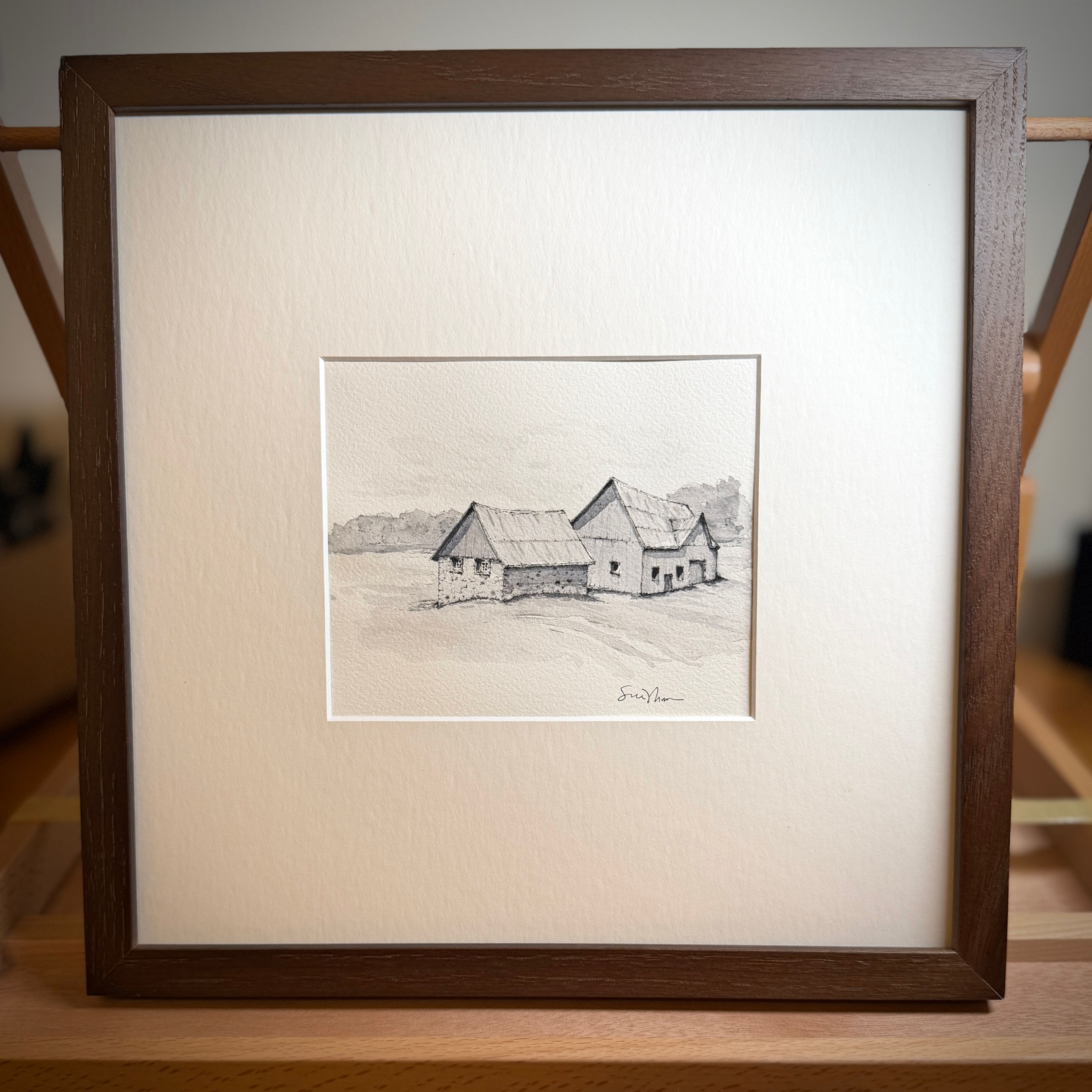 Framed view of Northern Farmstead, an original watercolor from Stoney Bend