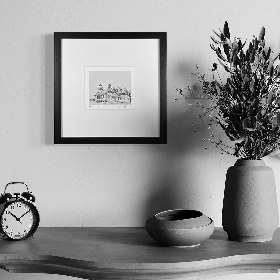 Thumbnail: Framed hand-drawn art print of Old Mission Lighthouse handing on a living room wall