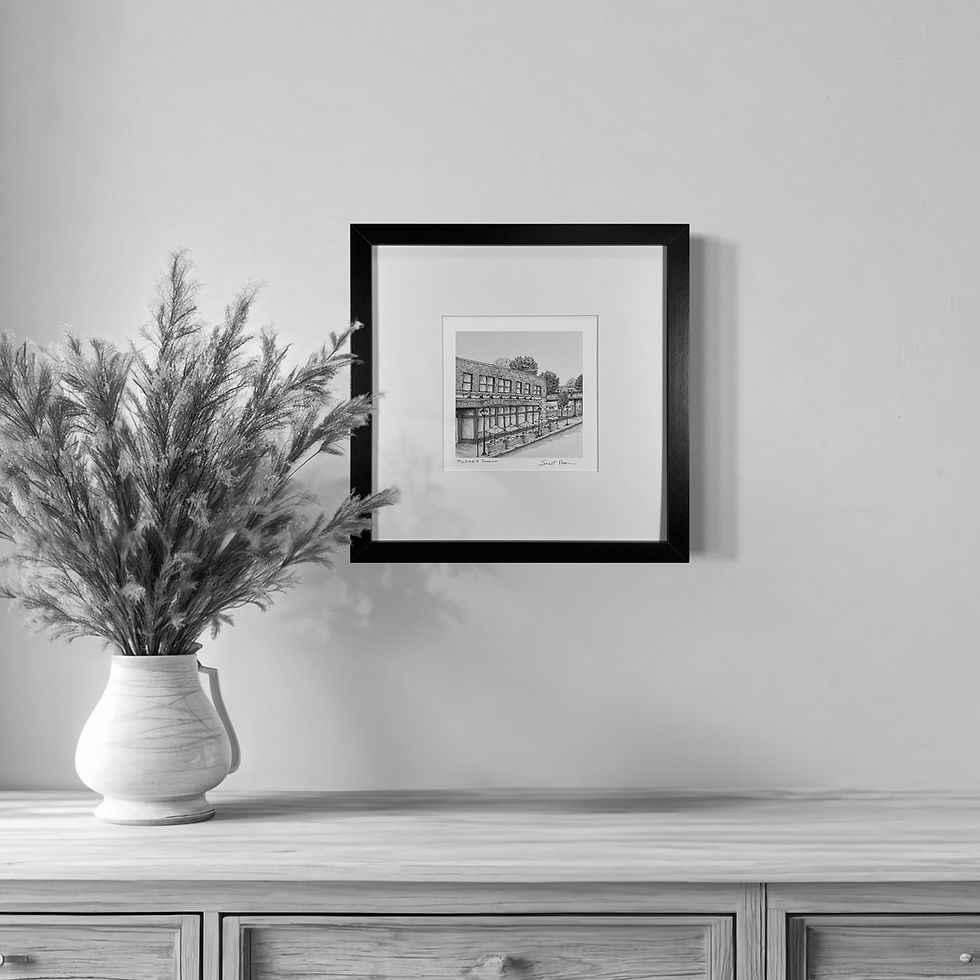 Thumbnail: McGee’s Tavern hand-drawn fine art print framed hanging in a living room