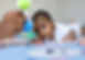 A little girl doing tummy time, a little girl. Newborn premature baby. Tummy time is fun t