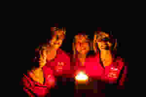 SHINING BRIGHT: BPW North Lakes Committee Member Debbie Ford, President Laurene Coates, BPWA Marketing Director Astrid Kuenne and Candle Lighting Ceremony Coordinator Raylene Teague light candles to encourage women in North Lakes to let their light shine.