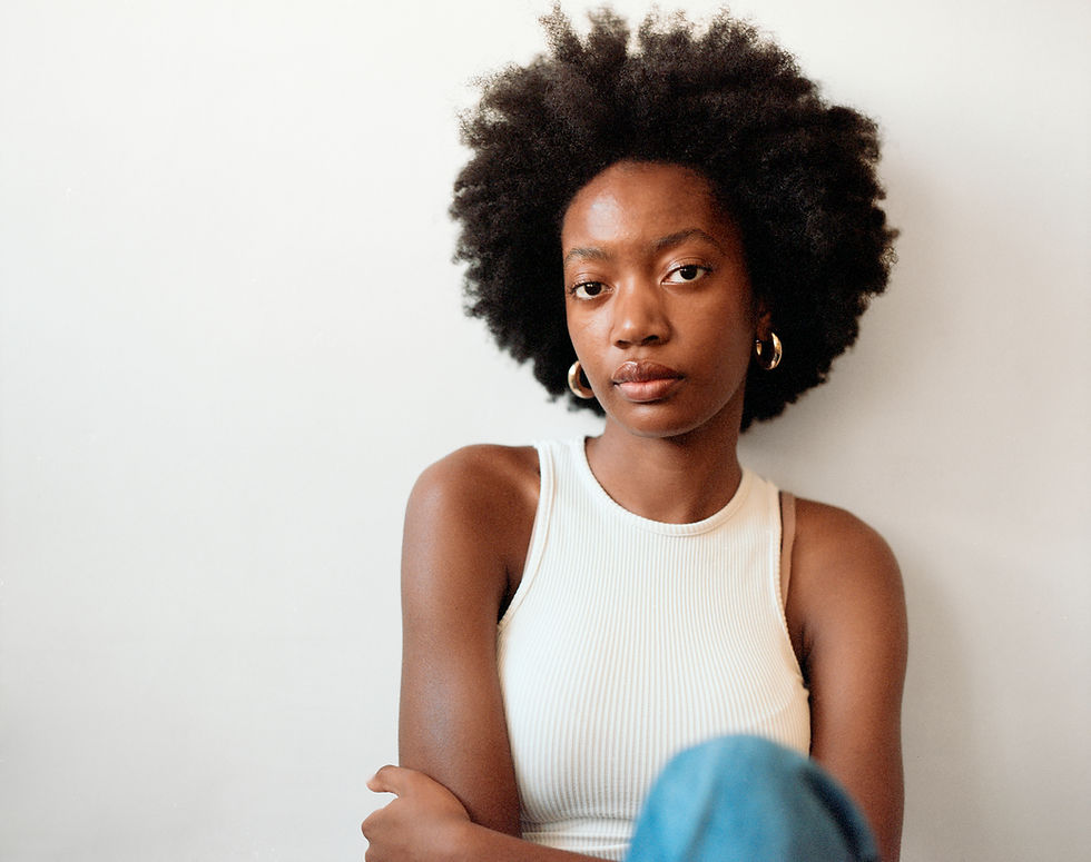 Woman Sitting down_Miscarriage Management
