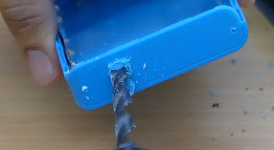 Creating A Hole to Pass the Booster Wires Through.