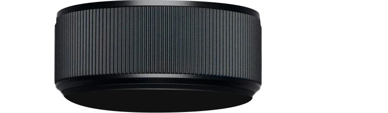 Dark cylindrical object with ribbed texture