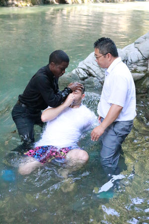 man getting baptized in Japan