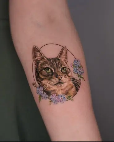 Colour tabby cat floral pet portrait tattoo by Sharon at The Story of Us MCR, near Deansgate Manchester