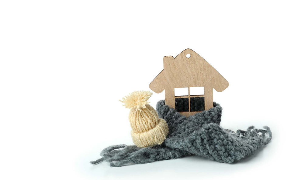 Toy house wrapped in scarf