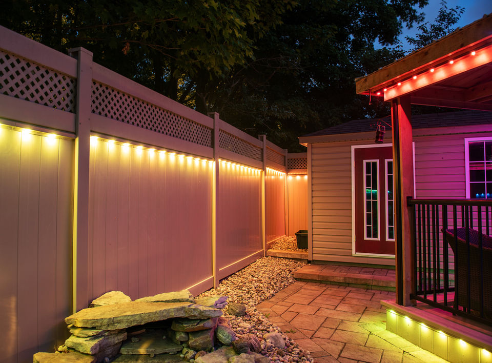 Colorful landscape lighting featuring warm white, yellow, oranges and reds