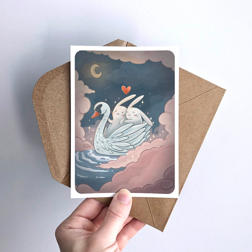 Miniature : Carte A6 illustration lapins amoureux sur cygne tenue en main avec enveloppe kraft, décor tendre et poétique