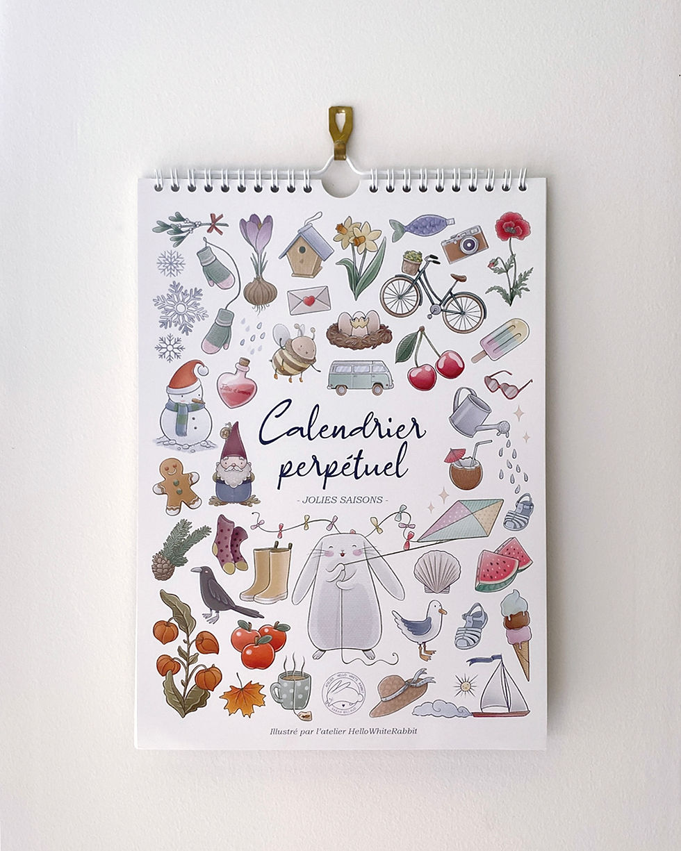 Miniature : Calendrier perpétuel fermé sur fond clair avec titre visible et design saisonnier délicat