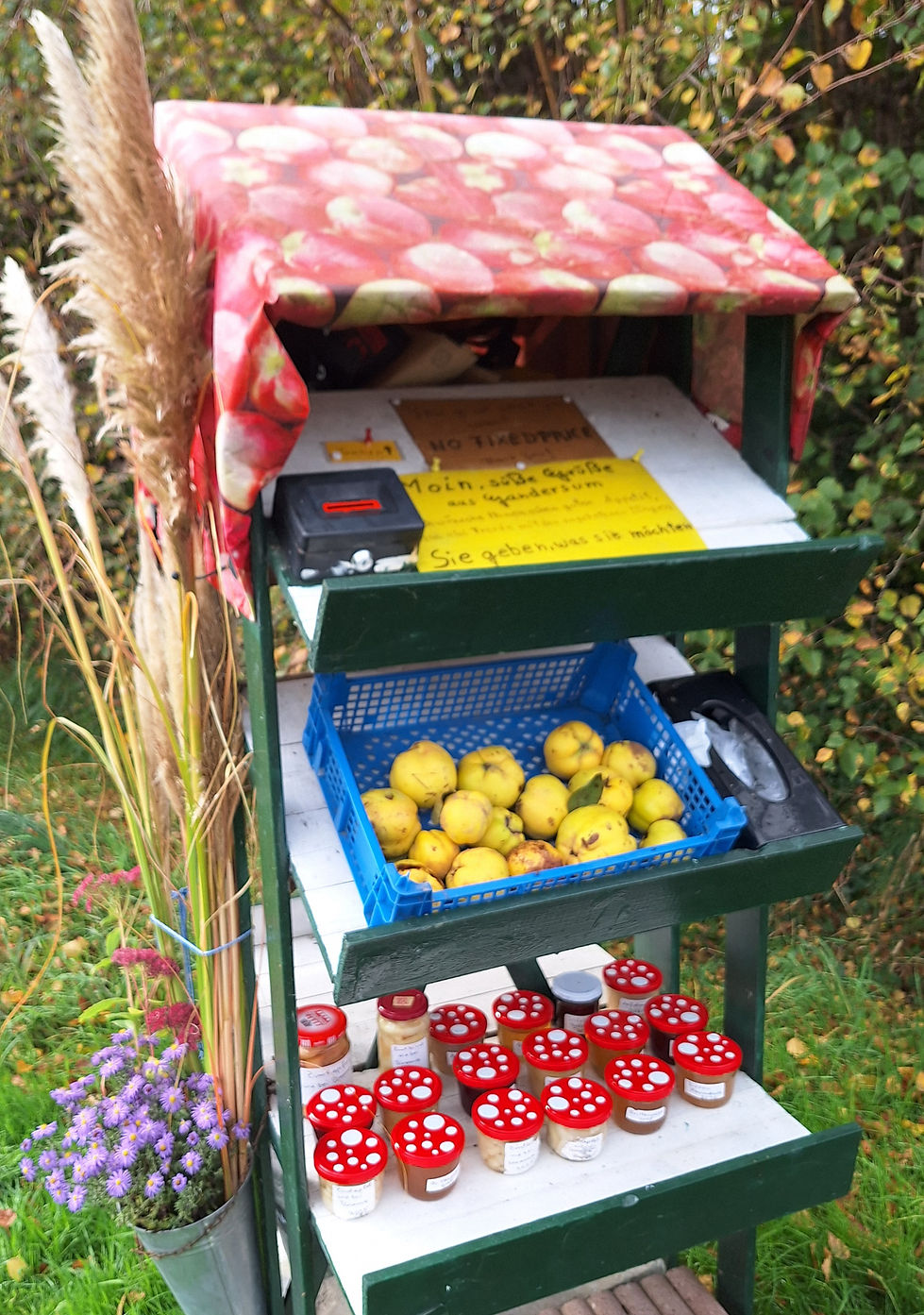 Verkaufstand an der Straße, Quitten