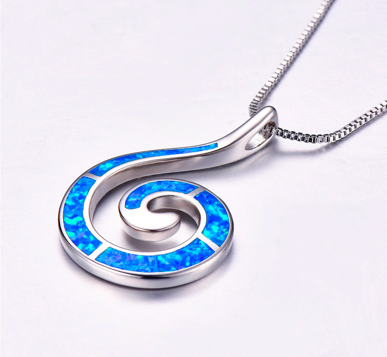 תמונה ממוזערת: תליון כסף ספירלה משובצת אבן חן אופל כחולה