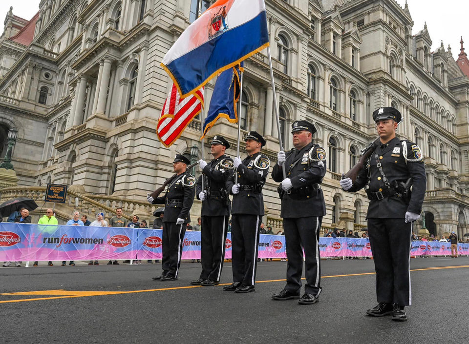 Run For Women 5k_Police with Flag.jpeg