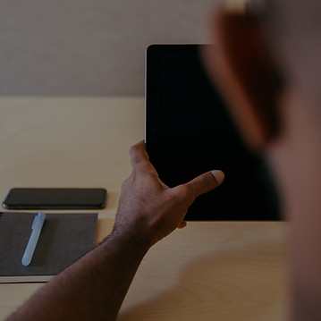 Designer at a startup working on an iPad