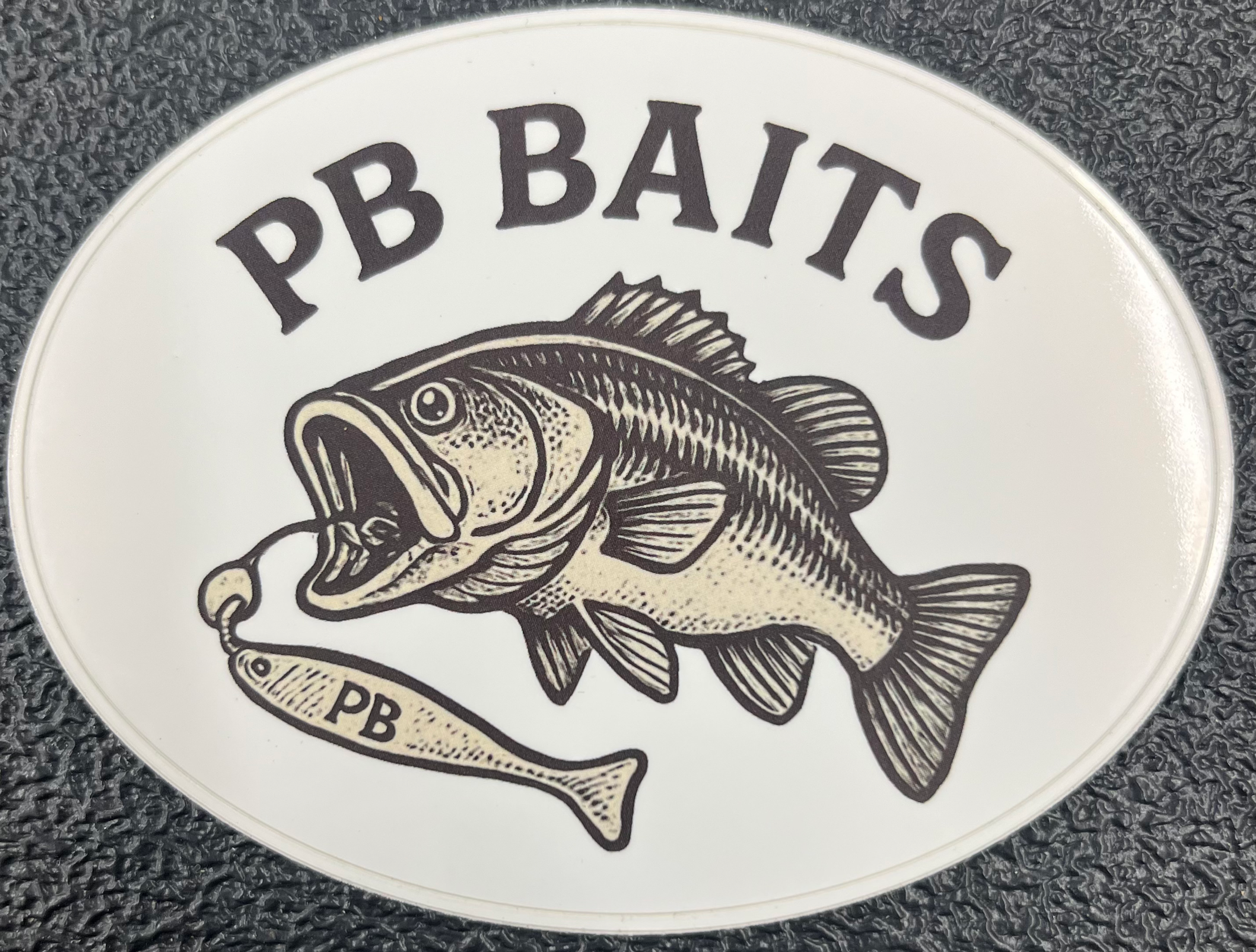PB BAITS logo sticker with a bass fish biting a lure