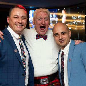 Attendees of an event posing for a photo